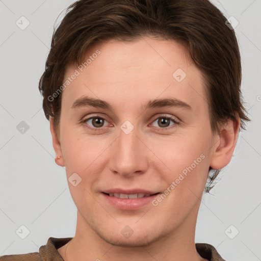 Joyful white young-adult female with short  brown hair and grey eyes