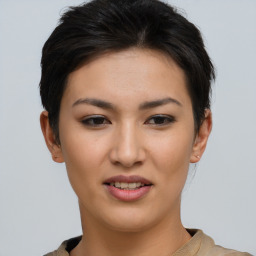 Joyful asian young-adult female with short  brown hair and brown eyes