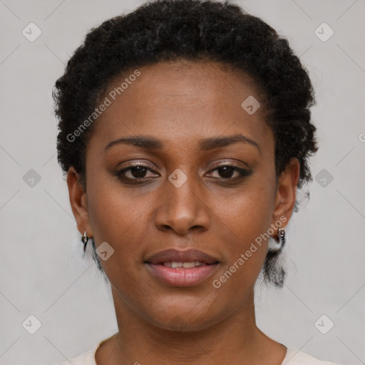 Joyful black young-adult female with short  brown hair and brown eyes