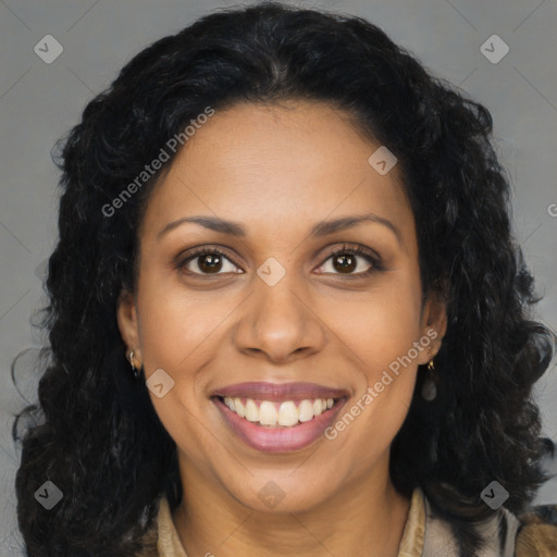 Joyful black young-adult female with long  brown hair and brown eyes