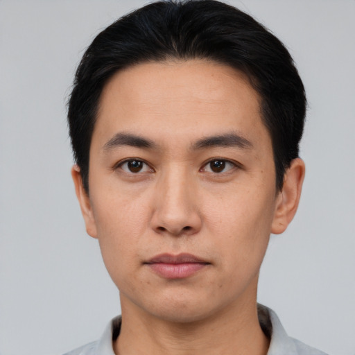 Neutral asian young-adult male with short  black hair and brown eyes
