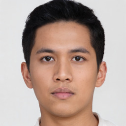 Neutral asian young-adult male with short  black hair and brown eyes