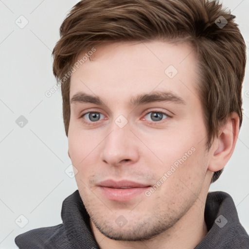 Neutral white young-adult male with short  brown hair and grey eyes