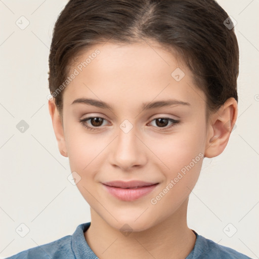 Joyful white child female with short  brown hair and brown eyes