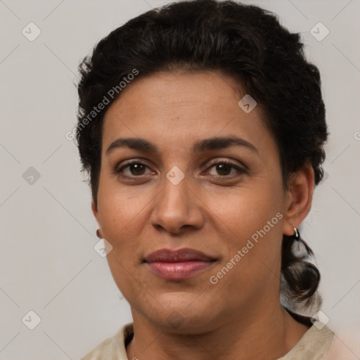 Joyful latino young-adult female with short  brown hair and brown eyes