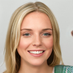 Joyful white young-adult female with medium  brown hair and green eyes