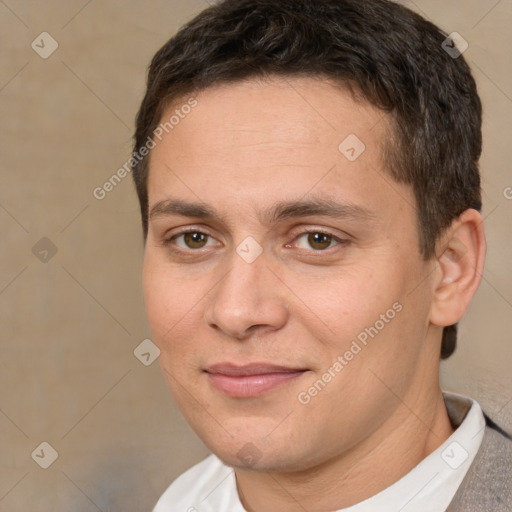 Joyful white adult male with short  brown hair and brown eyes