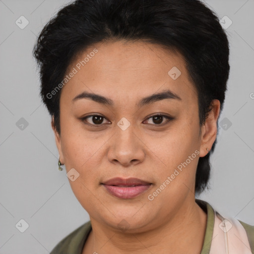 Joyful asian young-adult female with short  brown hair and brown eyes