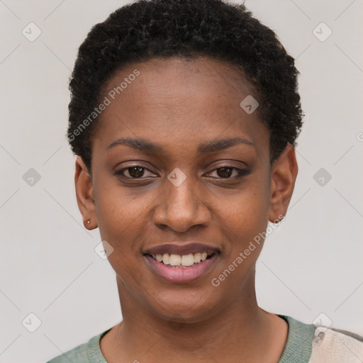 Joyful black young-adult female with short  black hair and brown eyes