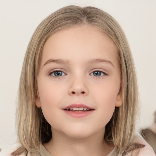 Joyful white child female with medium  brown hair and grey eyes