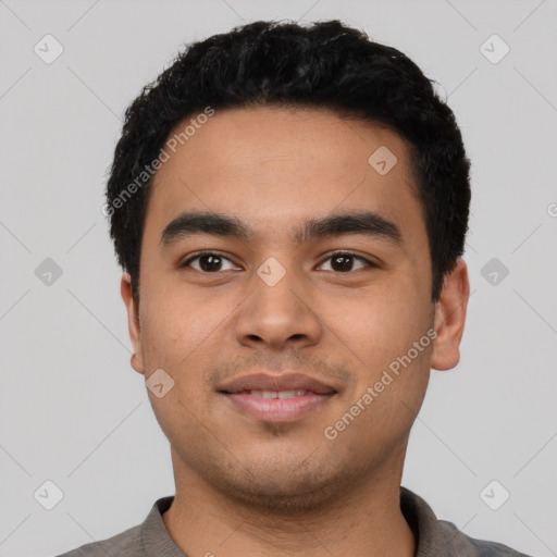 Neutral latino young-adult male with short  black hair and brown eyes