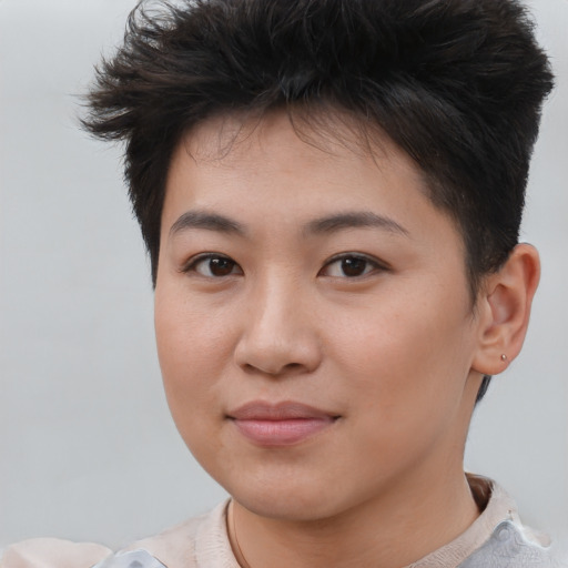 Joyful asian young-adult female with short  brown hair and brown eyes