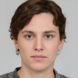 Neutral white young-adult male with medium  brown hair and brown eyes