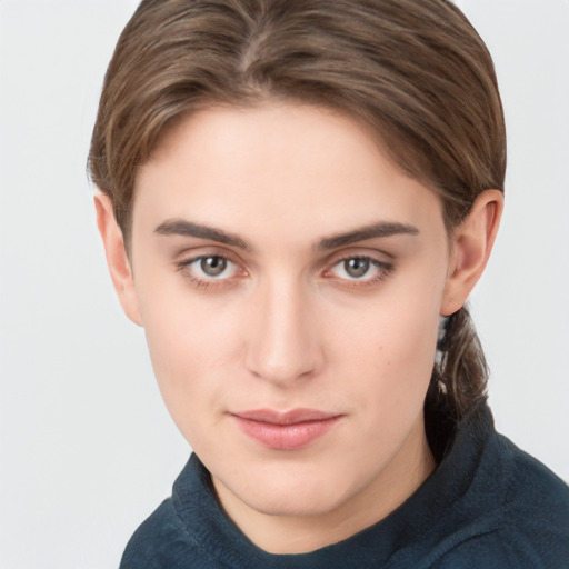 Neutral white young-adult female with short  brown hair and brown eyes