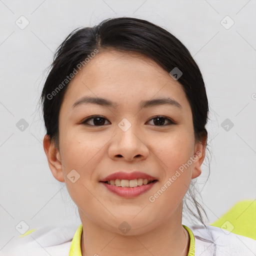 Joyful asian young-adult female with short  brown hair and brown eyes