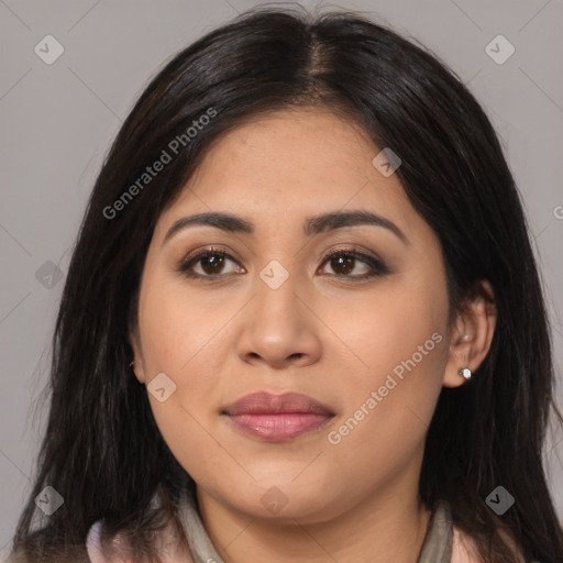 Joyful latino young-adult female with long  brown hair and brown eyes