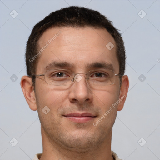 Joyful white adult male with short  brown hair and brown eyes