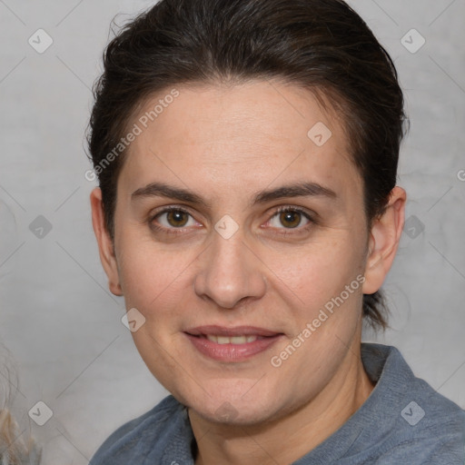 Joyful white adult female with medium  brown hair and brown eyes