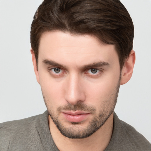 Neutral white young-adult male with short  brown hair and brown eyes