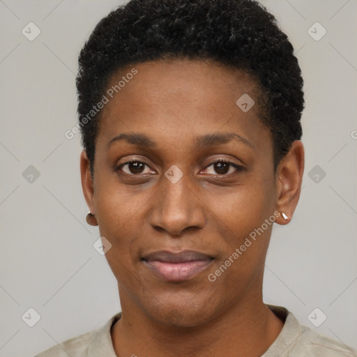 Joyful black young-adult female with short  black hair and brown eyes