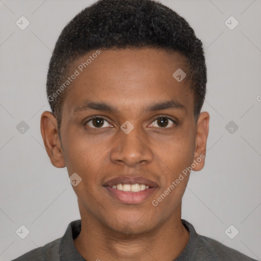 Joyful black young-adult male with short  brown hair and brown eyes