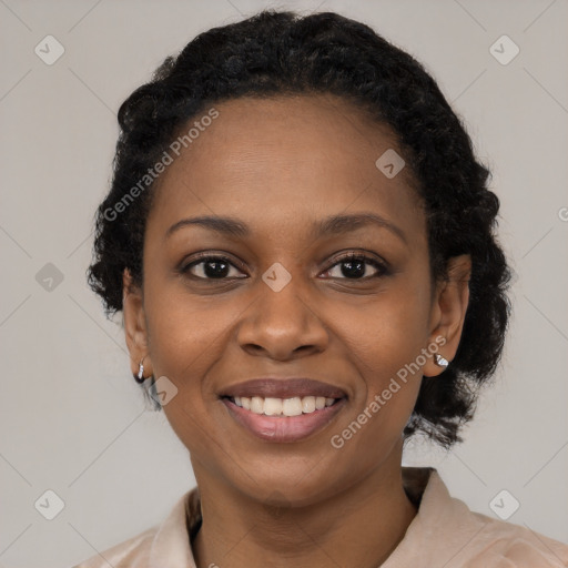 Joyful black young-adult female with medium  black hair and brown eyes