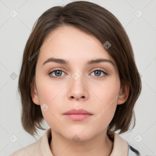 Neutral white young-adult female with medium  brown hair and grey eyes