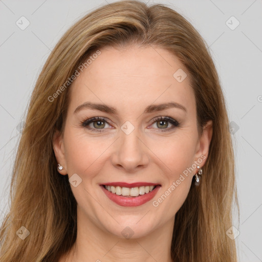 Joyful white young-adult female with long  brown hair and green eyes