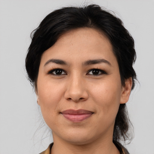 Joyful asian young-adult female with medium  brown hair and brown eyes