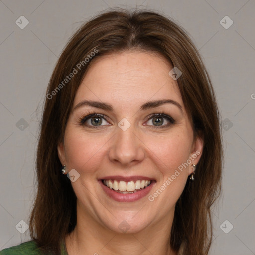 Joyful white young-adult female with medium  brown hair and green eyes