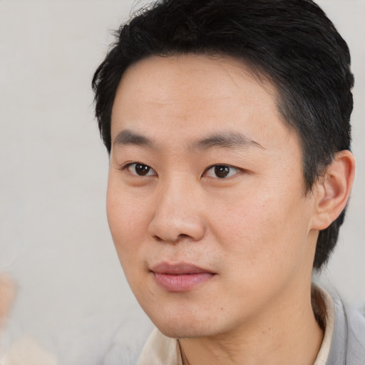 Neutral asian young-adult male with short  black hair and brown eyes
