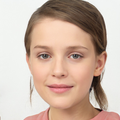 Joyful white child female with medium  brown hair and grey eyes