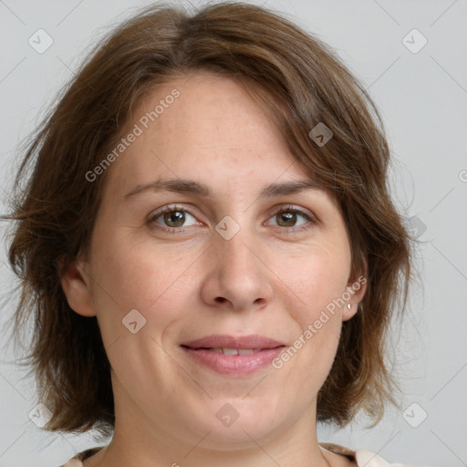 Joyful white young-adult female with medium  brown hair and green eyes