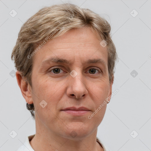 Joyful white adult female with short  brown hair and grey eyes