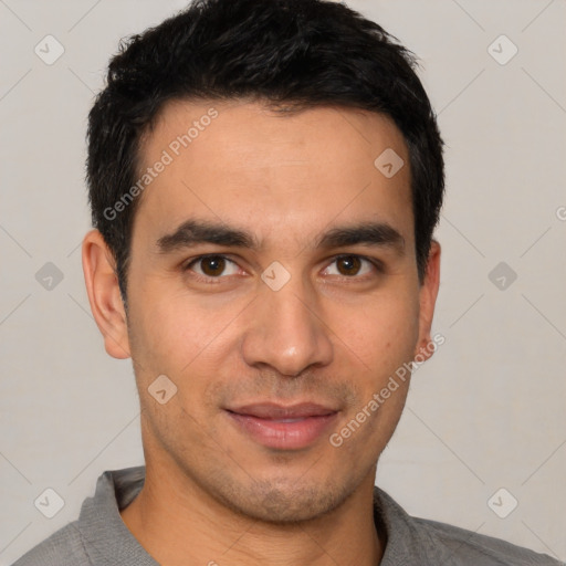 Joyful white young-adult male with short  black hair and brown eyes