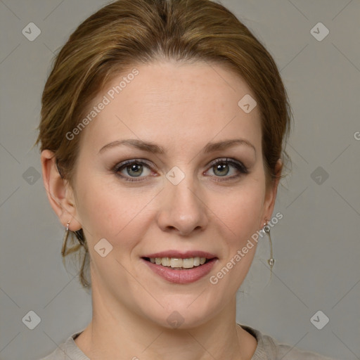 Joyful white young-adult female with medium  brown hair and grey eyes