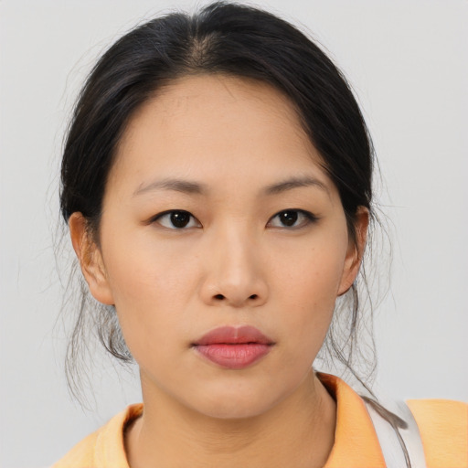 Neutral asian young-adult female with medium  black hair and brown eyes