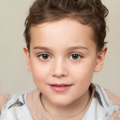 Joyful white child female with short  brown hair and brown eyes