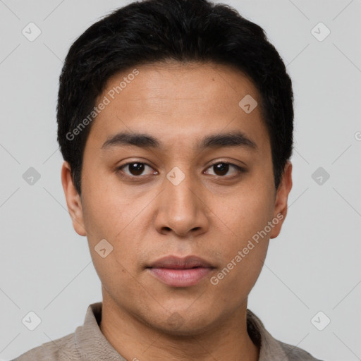 Neutral latino young-adult male with short  black hair and brown eyes