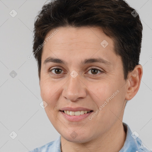 Joyful white adult female with short  brown hair and brown eyes