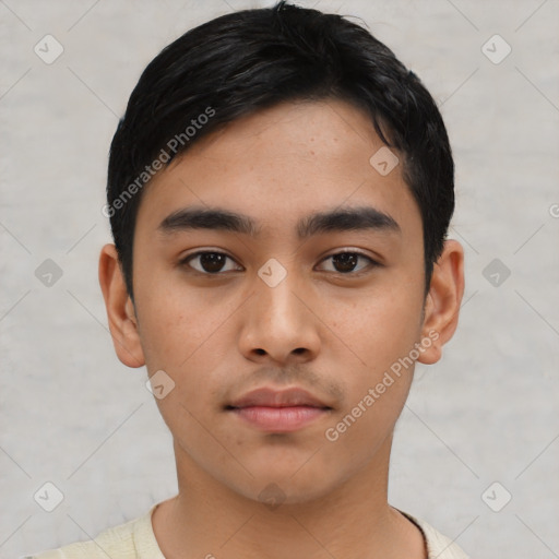 Neutral latino young-adult male with short  black hair and brown eyes