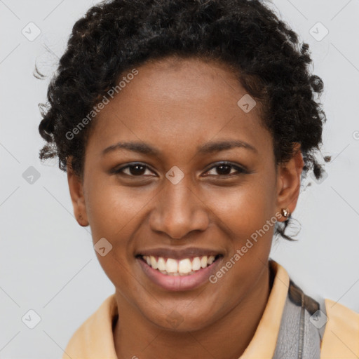 Joyful black young-adult female with short  brown hair and brown eyes