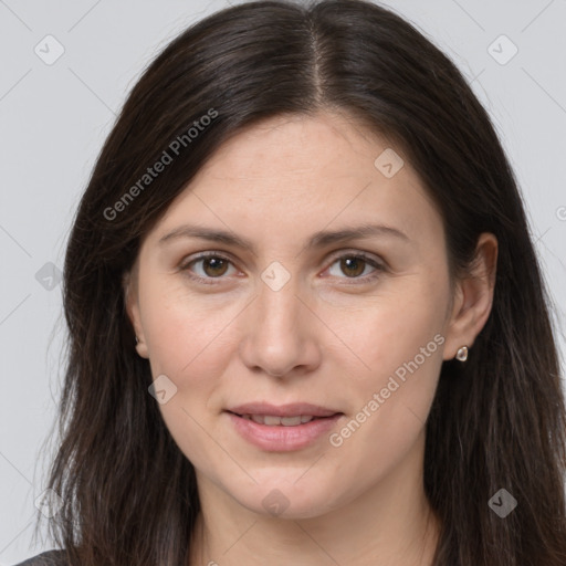 Joyful white young-adult female with long  brown hair and brown eyes