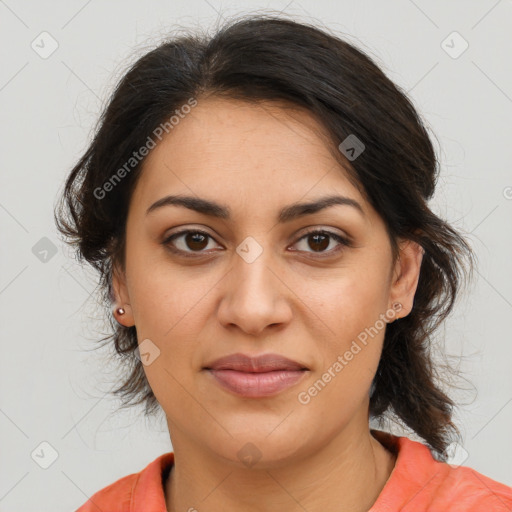 Joyful latino young-adult female with medium  brown hair and brown eyes