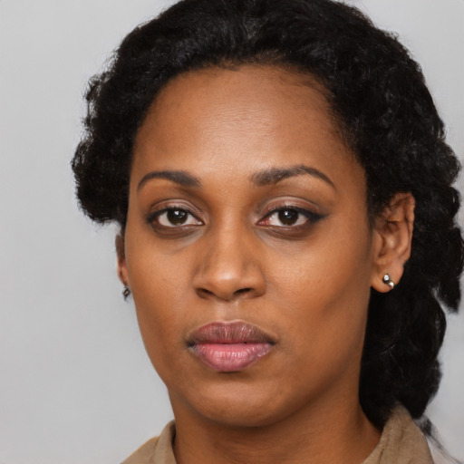 Neutral black young-adult female with long  black hair and brown eyes