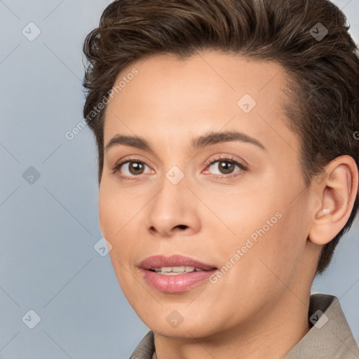 Joyful white young-adult female with short  brown hair and brown eyes