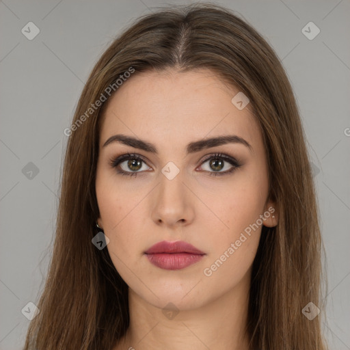 Neutral white young-adult female with long  brown hair and brown eyes