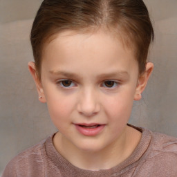 Joyful white child female with short  brown hair and brown eyes