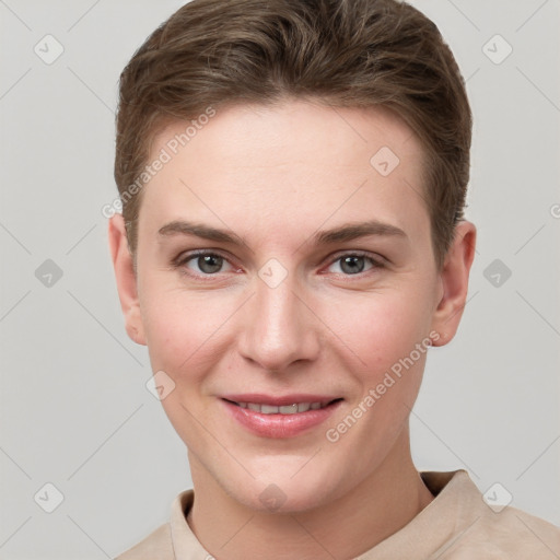 Joyful white young-adult female with short  brown hair and grey eyes