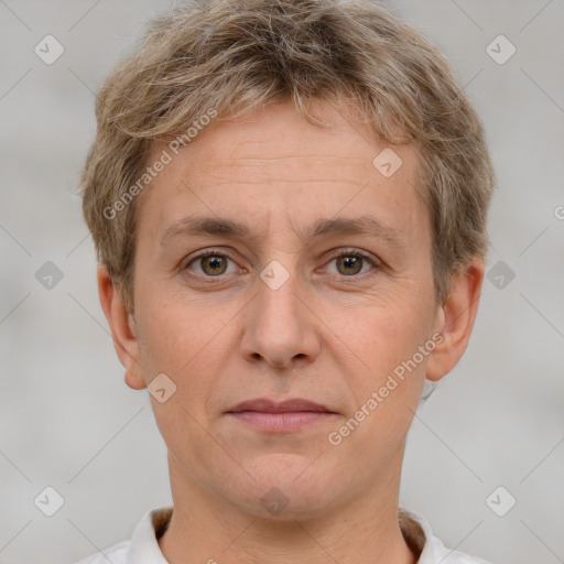 Joyful white adult male with short  brown hair and grey eyes